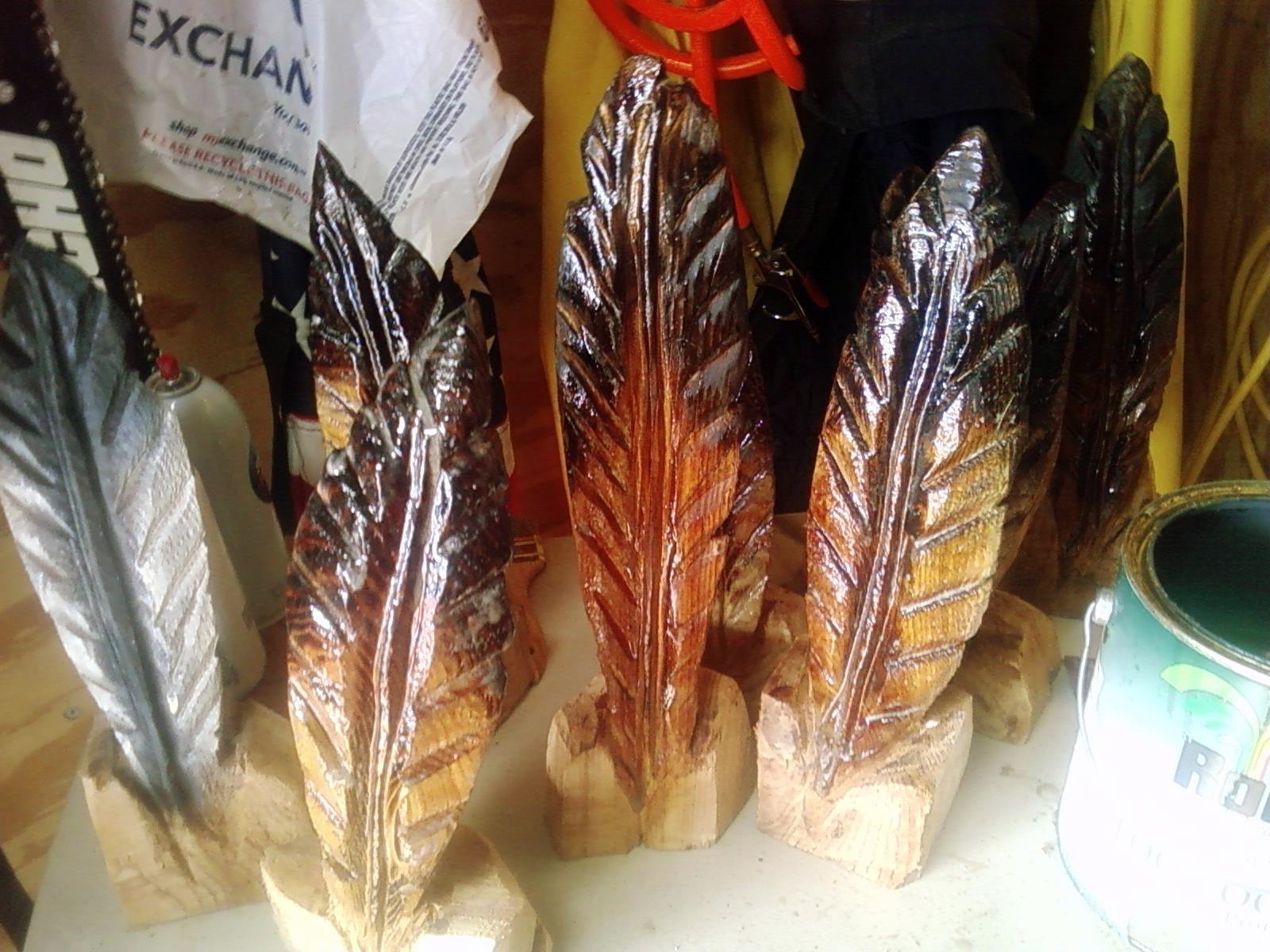 2011-03-02-Feathers-Chainsaw-Carved-Feathers-1.jpg