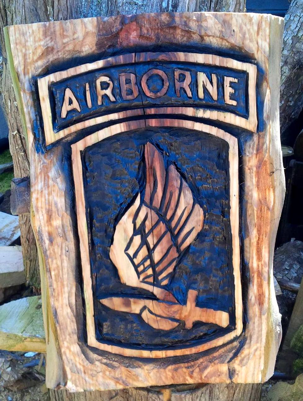 2014-05-13-Airborne-Chainsaw-Carved-Sign-1.jpg